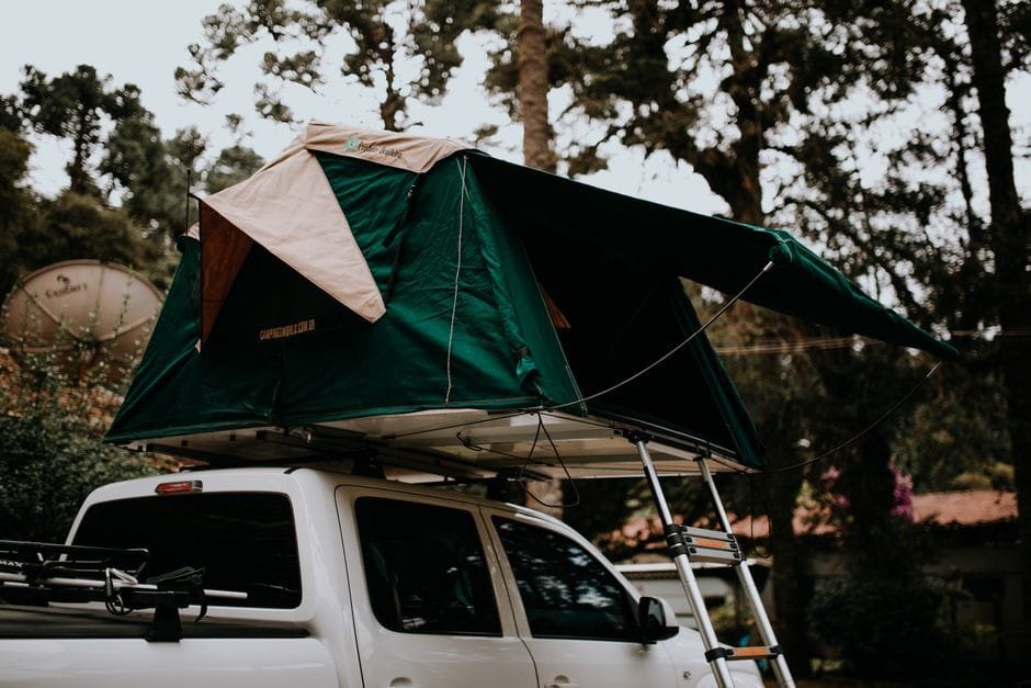 Explore scenic adventures with a rooftop tent on a pickup truck for ultimate outdoor camping. (Photo by Matheus Bertelli on Pexels)