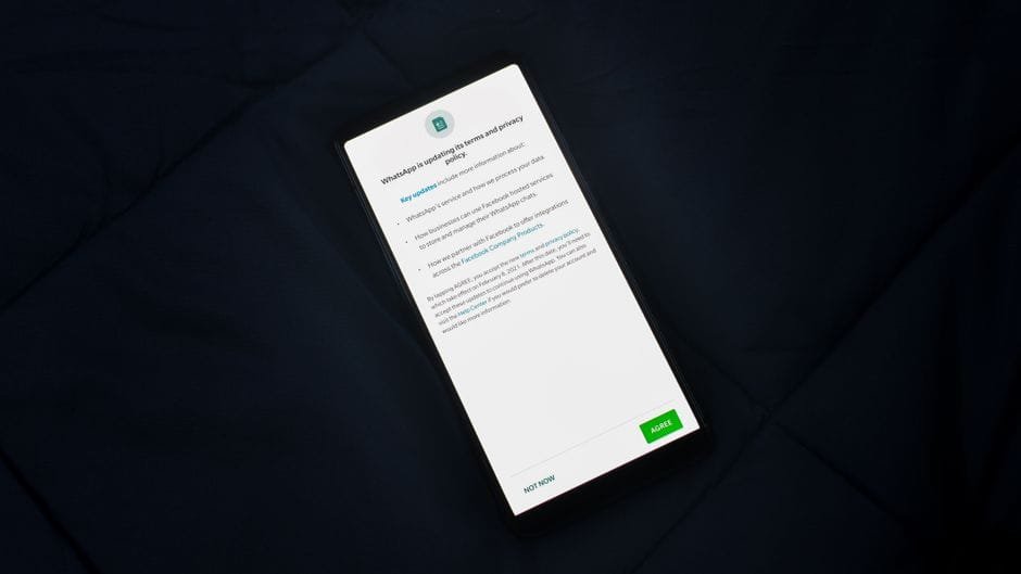 Close-up of smartphone screen showing a privacy policy update agreement. (Photo by Rahul Shah on Pexels)