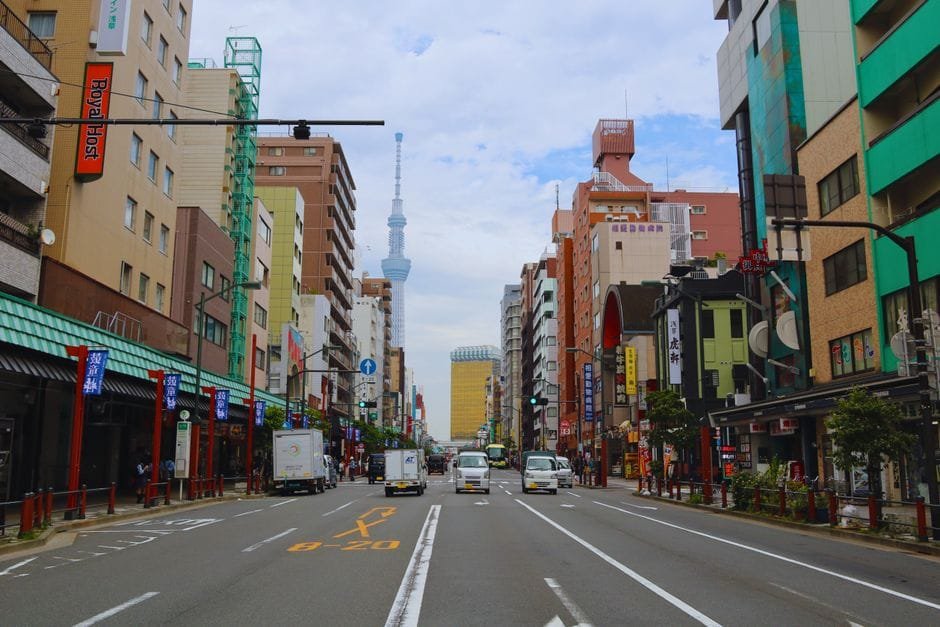 Vibrant street view in Tokyo with Skytree tower and bustling activity, capturing urban life. (Photo by Bruna Santos on Pexels)