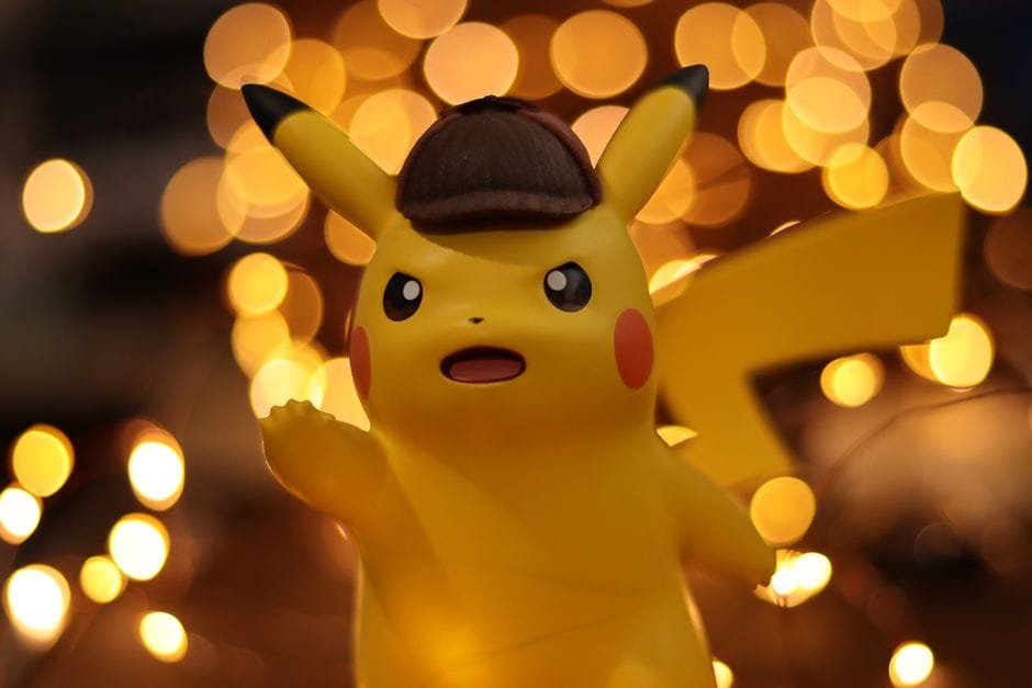 A close-up of a Pikachu figurine illuminated by a warm bokeh effect, creating an eye-catching visual. (Photo by Carolina Castilla Arias on Pexels)