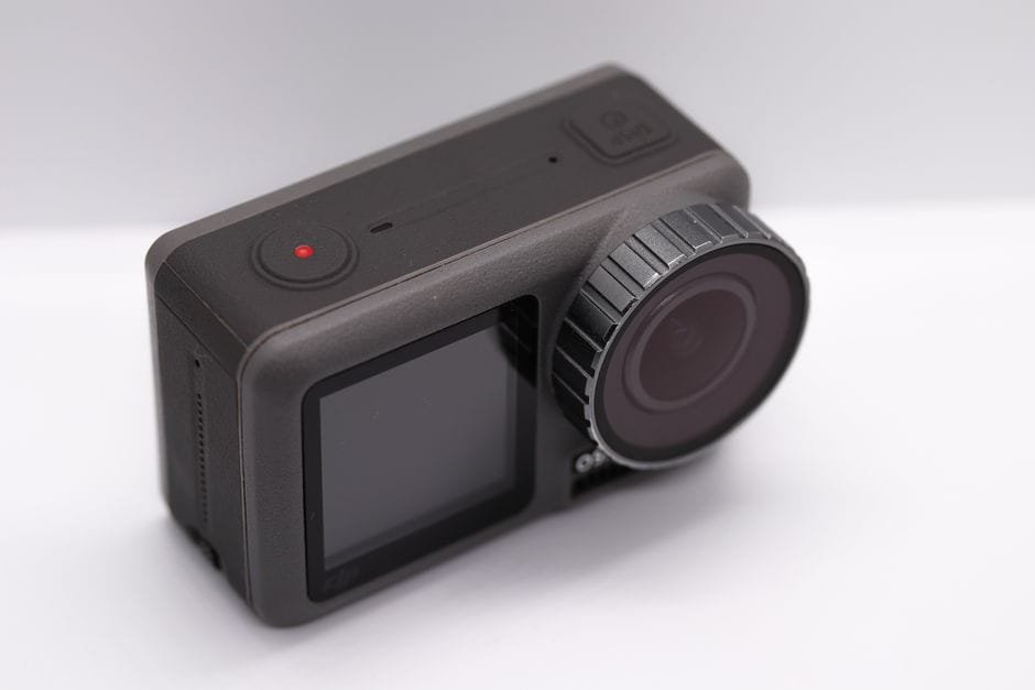 Minimalistic close-up of a modern action camera, showcasing its sleek black design and lens detail. (Photo by Abdelrahman Ahmed on Pexels)